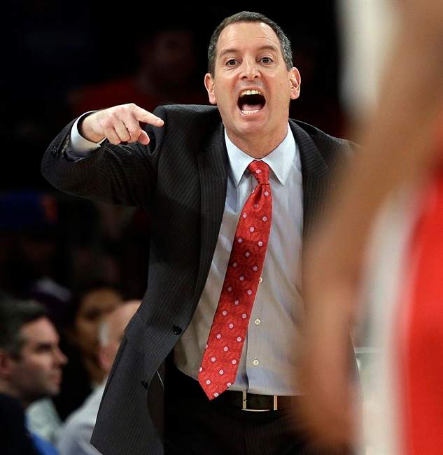  In this Tuesday, March 12, 2013 file photo, Rutgers head coach Mike Rice calls out to his team during the first half of an NCAA college basketball game against DePaul at the Big East Conference tournament, in New York. Rice was fired in early April 2013 for screaming at his players, calling them names, and kicking and shoving them. (AP Photo/Frank Franklin II, File).