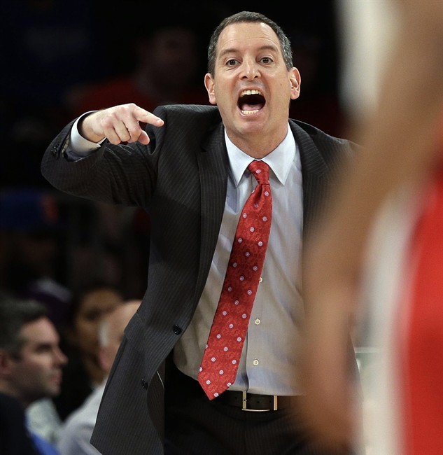  In this Tuesday, March 12, 2013 file photo, Rutgers head coach Mike Rice calls out to his team during the first half of an NCAA college basketball game against DePaul at the Big East Conference tournament, in New York. Rice was fired in early April 2013 for screaming at his players, calling them names, and kicking and shoving them. (AP Photo/Frank Franklin II, File).