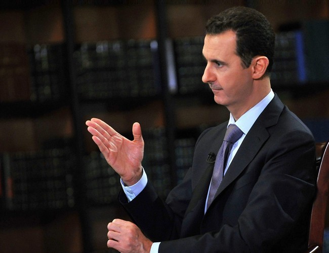 Syrian President Bashar Assad said it's still too early to say whether he'll run for re-election next year, but suggested he would refrain from seeking a third term.