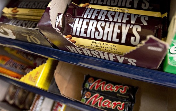 Hershey's and Mars chocolate bars are on display in a Montreal store on Friday, June 21, 2013 in Montreal.
