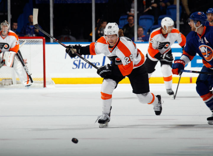 Claude Giroux #28 of the Philadelphia Flyers skates against the New York Islanders at the Nassau Veterans Memorial Coliseum on October 26, 2013 in Uniondale, New York.