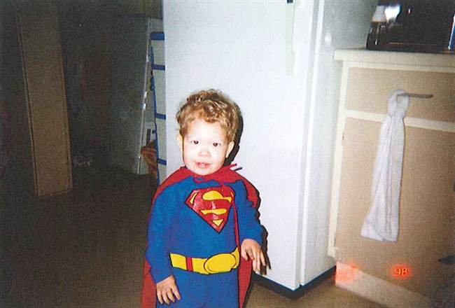 Jeffrey Baldwin is shown in a Halloween costume in this undated handout photo released at the inquest into his death. 