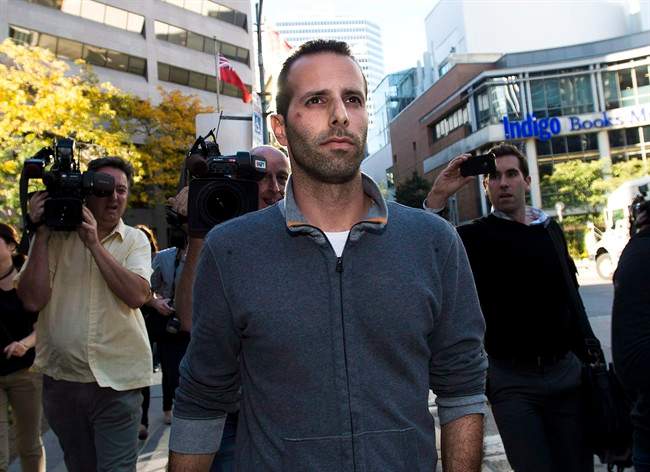 Alexander Lisi leaves Old City Hall court after being granted bail in Toronto on Wednesday, Oct. 2, 2013. 