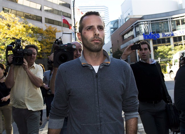 Alexander Lisi leaves Old City Hall court after being granted bail in Toronto on Wednesday, Oct. 2, 2013. 