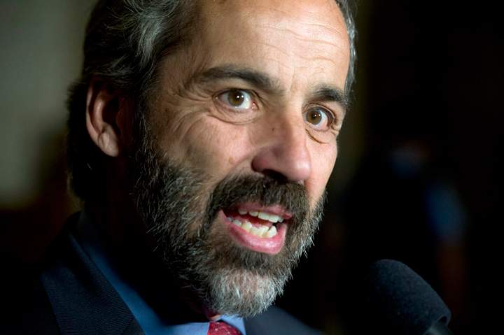 File photo - Bloc Quebecois Leader Daniel Paille speaks to reporters following Question Period in the foyer of the House of Commons in Ottawa on Wednesday, April 24, 2013. 