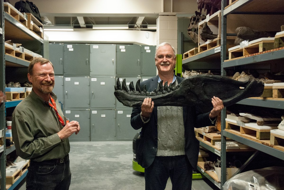 Comedian John Cleese takes a tour of the Royal Tyrrell Museum with Dr. Donald Henderson.