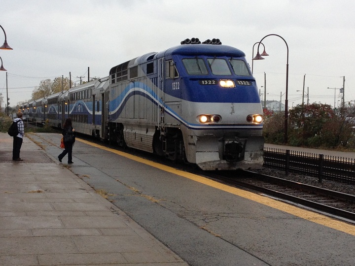 Commuters waiting at Dorval train station during morning rush hour on October 22, 2013.