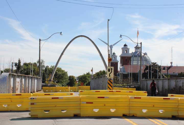 Yellow barriers block vehicles from crossing the Dufferin Bridge near Exhibition Place. The bridge was closed to traffic in June 2013.