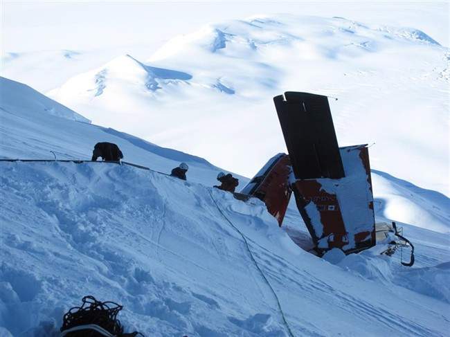 The wreckage from a Canadian plane that crashed in Antarctica on Jan. 23, 2013, killing three Canadians on board is shown in a handout photo.