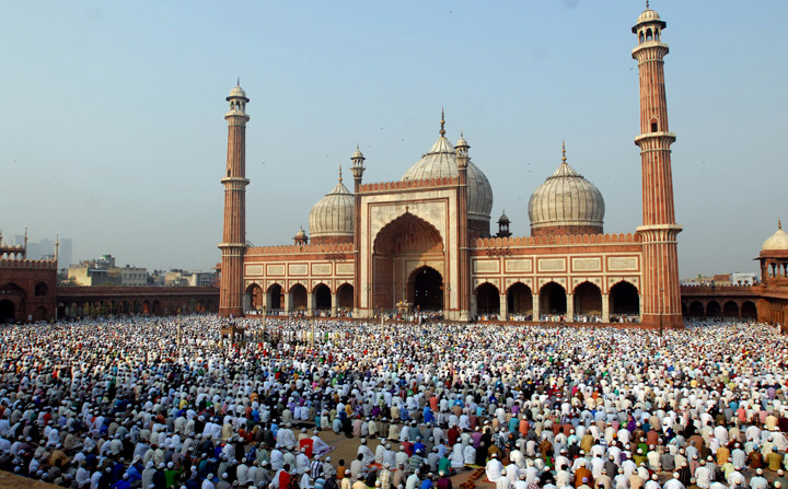 Indian Muslim devotees pray during the festival of Eid al-Adha at Jama Masjid Mosque in New Delhi on October 16, 2013.