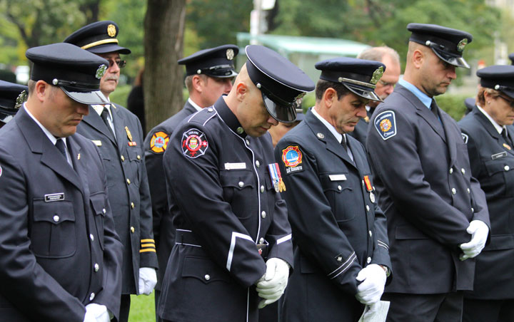 Fire fighters from across the province attend the Ontario Fallen Fire Fighters Memorial Service in Toronto on Oct. 6. (John R. Kennedy / Global News).