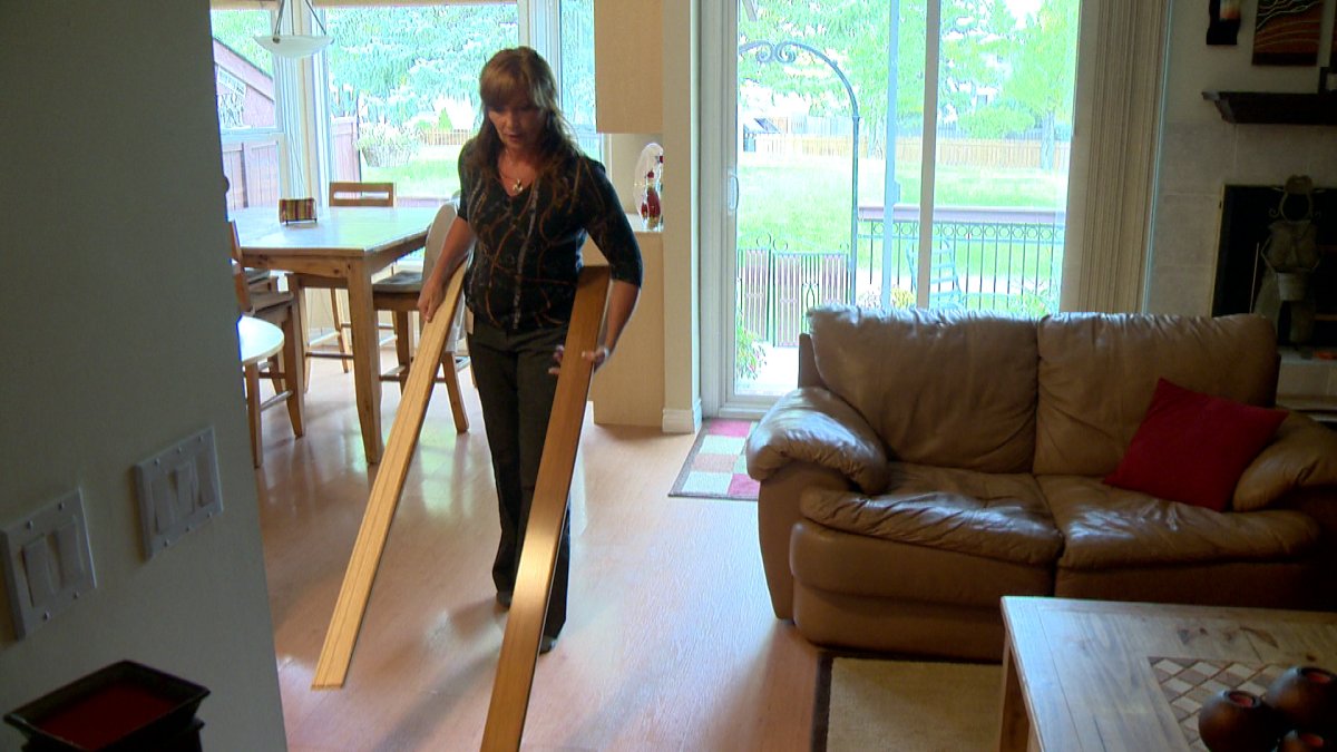 Sheila Laird with her new hardwood flooring.
