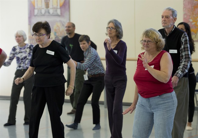 Participants take part in a Parkinsons Dance class at the National Ballet School in Toronto on Tuesday October 22, 2013. Researchers have teamed up with Canada's National Ballet School to provide classes for people with Parkinson's to determine if learning and executing dance steps may help relieve symptoms and alter the course of the disease.