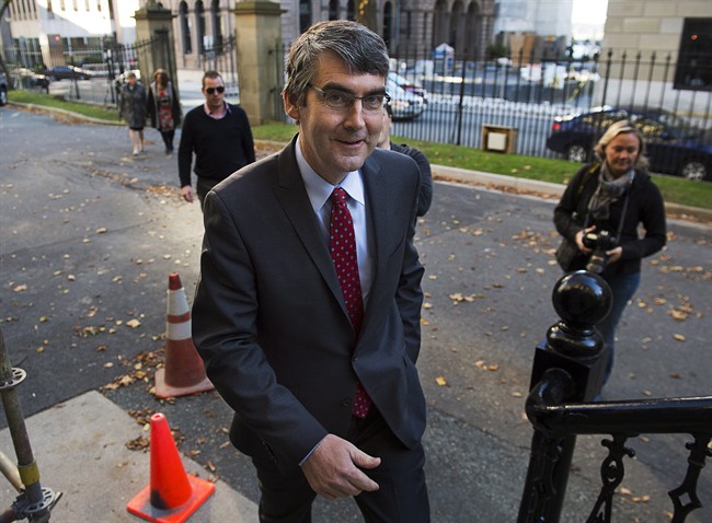 Premier-designate Stephen McNeil arrives at the legislature in Halifax on Wednesday, Oct. 9, 2013.