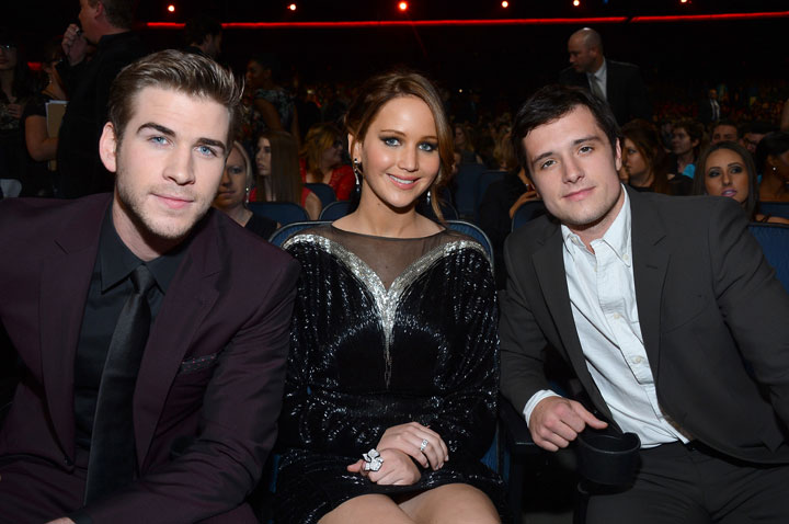 Josh Hutcherson, right, with co-stars Liam Hemsworth and Jennifer Lawrence.