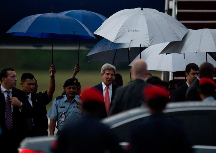 US Secretary of State John Kerry (C) arrives at the Royal Malaysian Air Force base in Subang, outside Kuala Lumpur on October 10, 2013. Kerry arrived for the 4th Global Entrepreneurship Summit and to hold talks with the Malaysian leadership on bilateral and international issues. AFP PHOTO / MOHD RASFAN (Photo credit should read MOHD RASFAN/AFP/Getty Images).