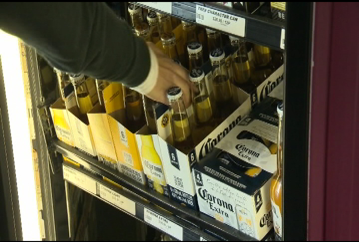 The Liberals and Opposition New Democrats are feuding over the cost of drinks in the weeks leading up to major liquor reforms in British Columbia on April 1.