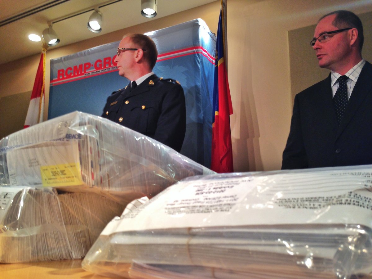 RCMP explain a mail fraud scam. Pat Carroll/Global News.