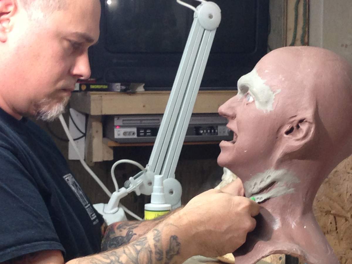 Special Effects Makeup Artist, Marc Deveault, working on one of his creations.