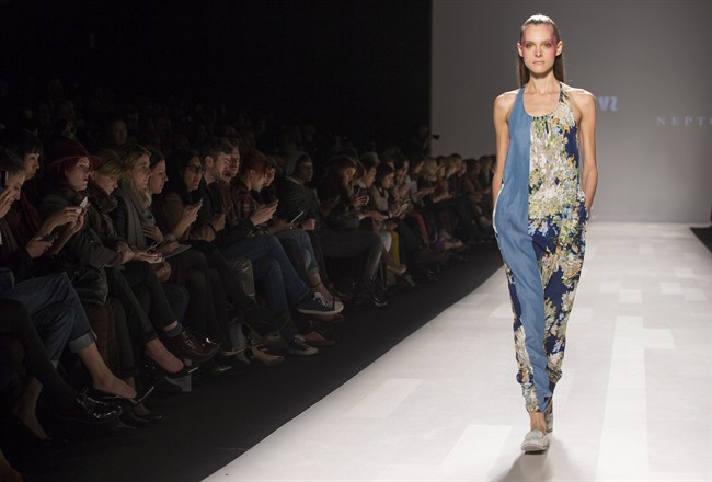 A model walks the runway in the Melissa Nepton show during Toronto Fashion Week in Toronto, Tuesday October 22, 2013. 