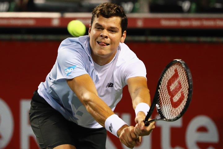 Milos Raonic in action during men's quarter final singles match against Lukas Lacko of Slovakia during day five of the Rakuten Open at Ariake Colosseum on October 4, 2013 in Tokyo, Japan. 