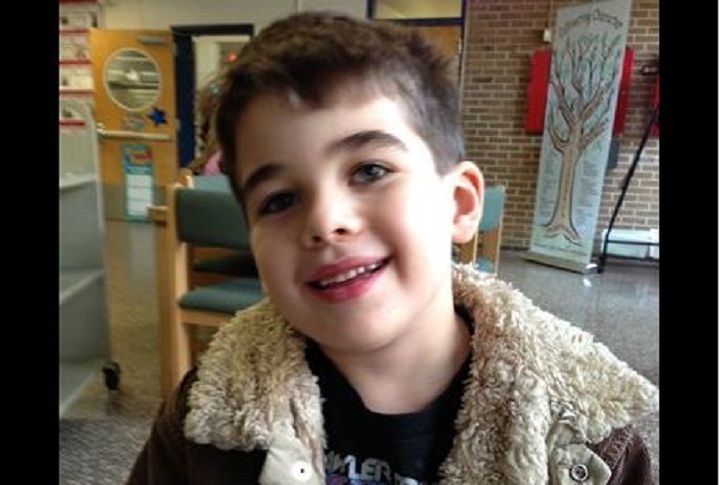 FILE - In this Nov. 13, 2012 file photo provided by the family via The Washington Post shows Noah Pozner. The six-year-old was one of the victims in the Sandy Hook elementary school shooting in Newtown, Conn. on Dec. 14, 2012. A New York City woman who posed Pozner's aunt and solicited money was sentenced on Tuesday, Oct. 15, 2013 to eight months in prison. 