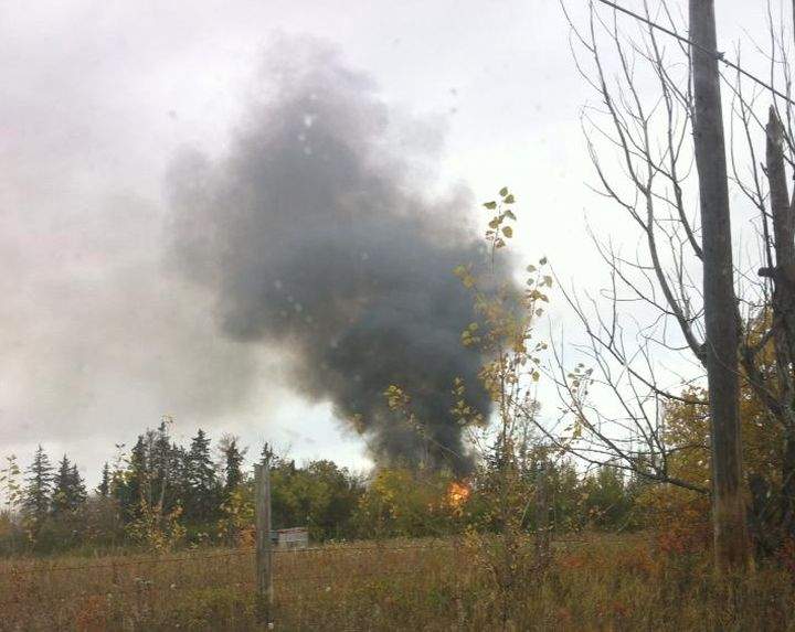 An abandoned house in the area of 153rd Avenue and Fort Road caught fire Sunday, October 6, 2013.