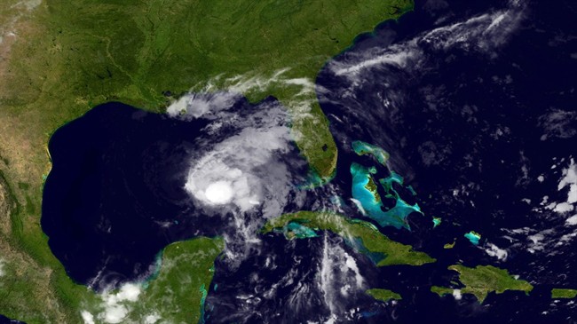 This image provided by NOAA shows Tropical Storm Karen taken late Thursday night Oct. 3, 2013. 