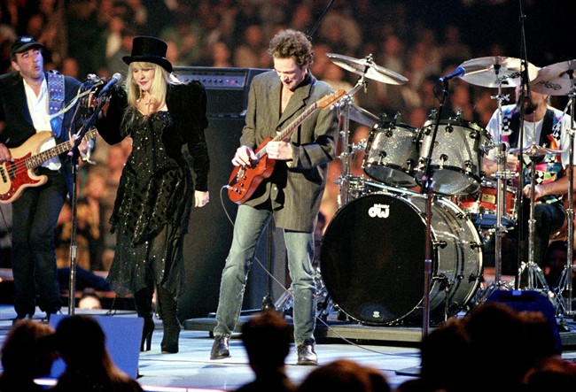 In a Monday, Jan. 18, 1993 file photo, the rock group Fleetwood Mac, reuniting after 13 years apart, performs during the American Gala evening at the Capital Centre in Landover, Md.