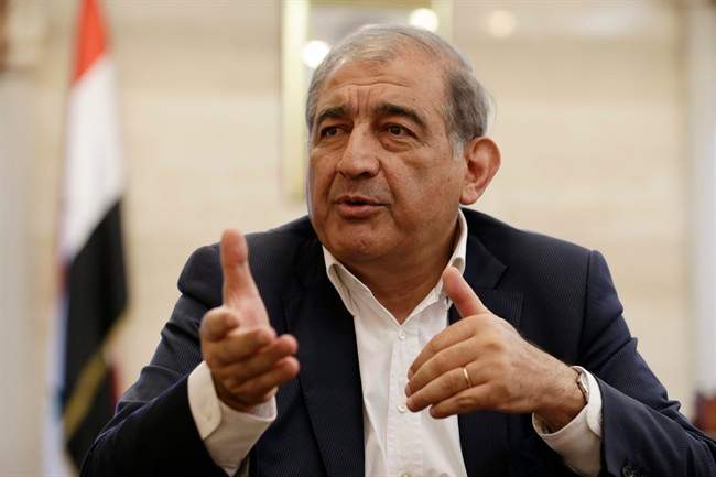 Syrian Deputy Prime Minister Qadri Jamil speaks during an interview with Associated press, in Cairo, Egypt, in this Thursday, Aug. 22, 2013 file photo. 