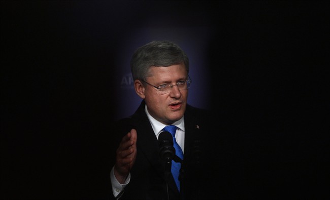 Prime Minister Stephen Harper takes part in a closing press conference in Nusa Dua, Bali, Indonesia on Tuesday, October 8, 2013. THE CANADIAN PRESS/Sean Kilpatrick.