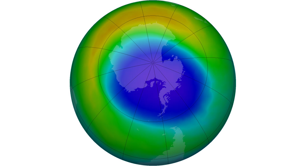 False-color view of total ozone over the Antarctic pole. The purple and blue colours are where there is the least ozone, and the yellows and reds are where there is more ozone.