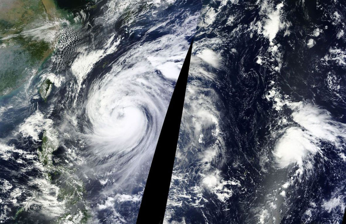 Satellite imagery showing both Typhoon Fitow and tropical depression 23W in the North Pacific Ocean. (NASA/EOSDIS)