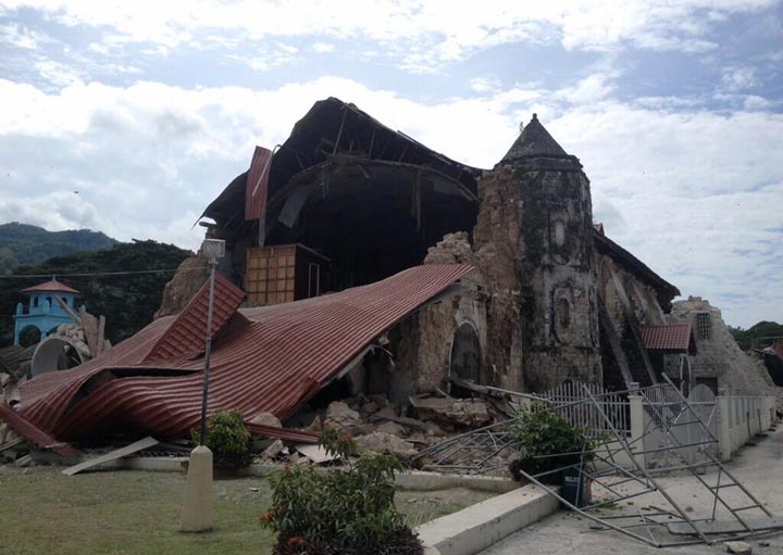 Damage to the roof and structure of the Church of San Pedro in the town Loboc, Bohol is seen after a major 7.2 magnitude earthquake struck the region on October 15, 2013. (Robert Michael Poole/AFP/Getty Images)