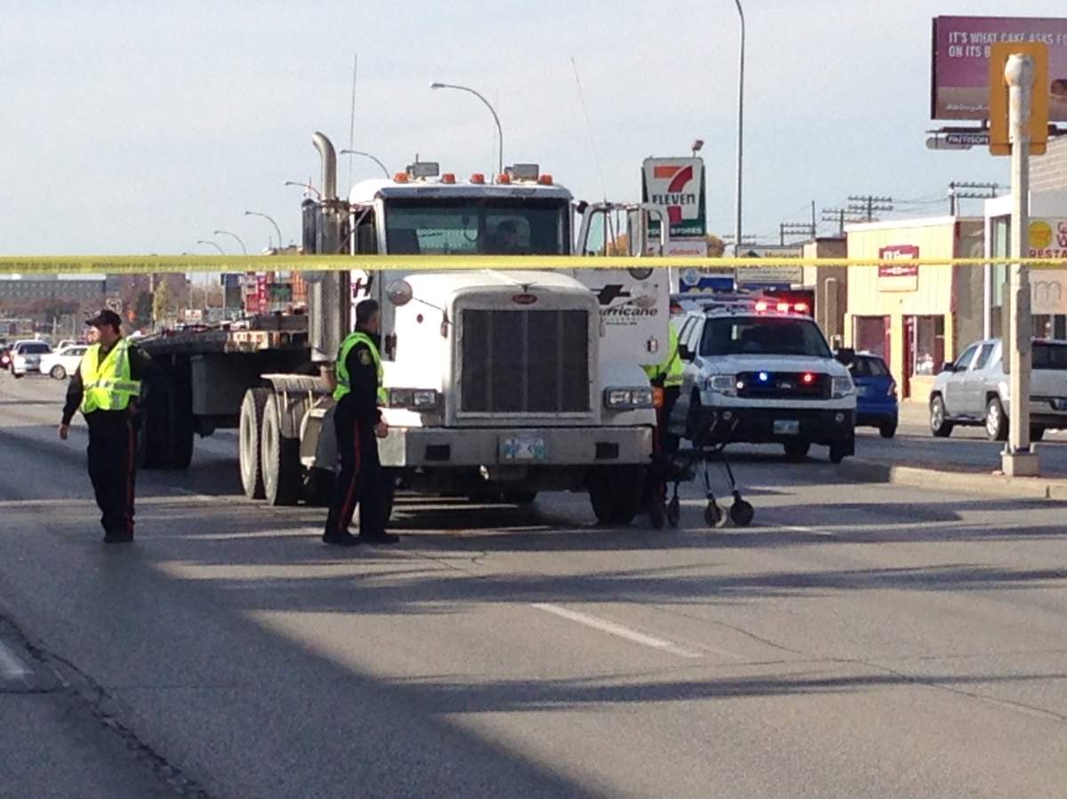 Witnesses say a man with a walker was crossing Portage Avenue with the light, but his progress was so slow the light changed while he was still on the street when it changed and he was hit.