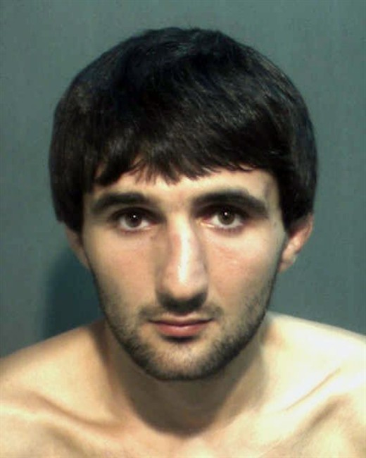 This May 4, 2013 police mugshot provided by the Orange County Corrections Department in Orlando, Fla., shows Ibragim Todashev after his arrest for aggravated battery in Orlando.