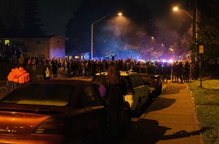 Hundreds of college-age revelers in Washington state - thwarted in efforts to continue a large party - threw projectiles at police who responded with pepper spray to disperse them.