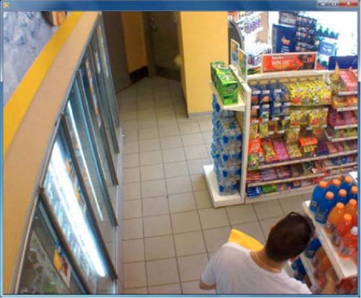 Police surveillance of Ford and Lisi with packages at a Scarlett Road gas station - image