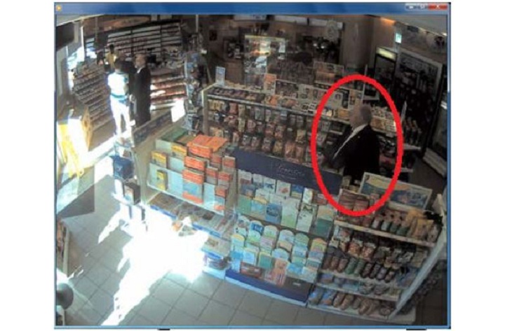 Police surveillance of Ford and Lisi with packages at a Scarlett Road gas station - image
