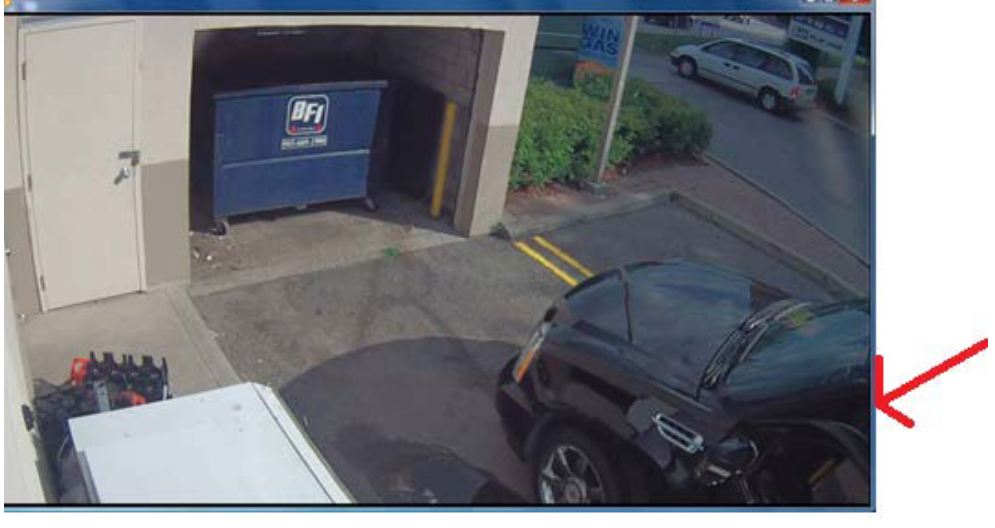 Police surveillance of Ford and Lisi with packages at a Scarlett Road gas station - image
