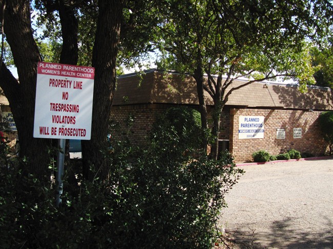 Employees were the only people at Planned Parenthood Women's Health Center in Lubbock, Texas on Monday, Oct. 28, 2013. New abortion restrictions passed by the Texas Legislature are unconstitutional and will not take effect as scheduled on Tuesday, a federal judge has ruled. 