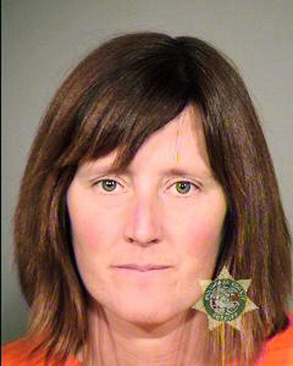 This undated file photo provided by the Multnomah County Sheriff's Office in Portland, Ore., shows Rebecca Rubin. She pleaded guilty in federal court on Oct. 10, 2013.  