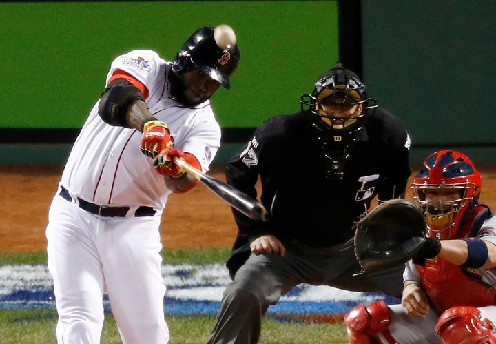 David Ortiz of the Boston Red Sox hits a home run in the seventh inning against the St. Louis Cardinals during Game 1 of the 2013 World Series at Fenway Park on October 23, 2013 in Boston, Massachusetts.  