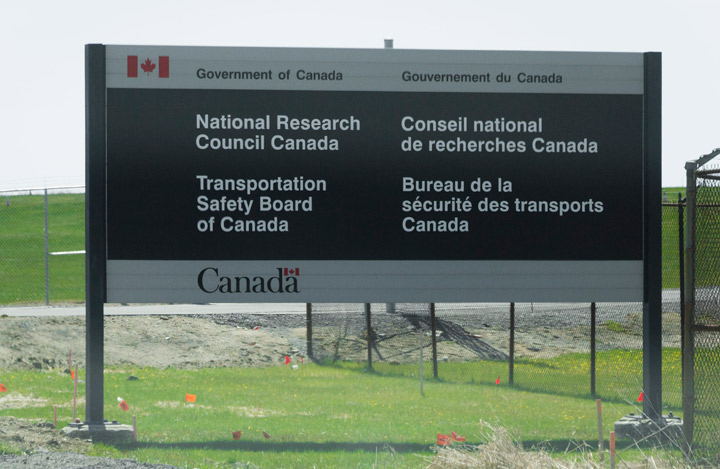 A bilingual National Research Council Canada and Transportation Safety Board of Canada sign is pictured in Ottawa, Ontario April 29, 2012.