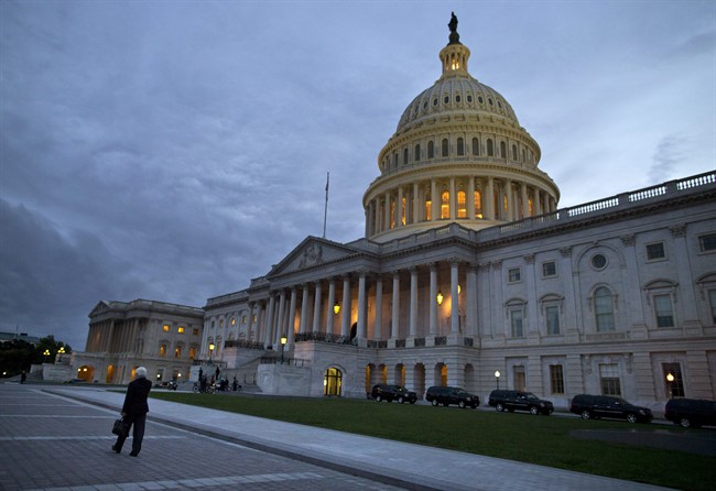 This file photo, shows a view of the U.S. Capitol building at dusk in Washington.