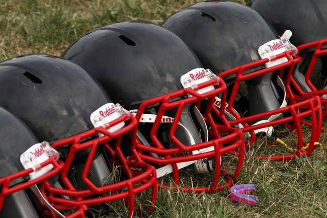 A New Brunswick high school football coach made the decision to forfeit a game at halftime after nine players suffered head injuries.