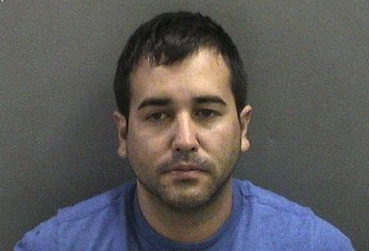 This image provided by the Orange County District Attorney's Office shows Kyle Handley, one of four people charged with kidnapping a California marijuana dispensary owner, torturing him with a blowtorch and cutting off his penis during a robbery because they thought he was burying piles of cash in the desert, authorities said Friday, Nov. 8, 2013. Also arrested were Ryan Anthony Kevorkian, 34, Naomi Josette Kevorkian, 33, and 34-year-old Hossein Nayeri. 