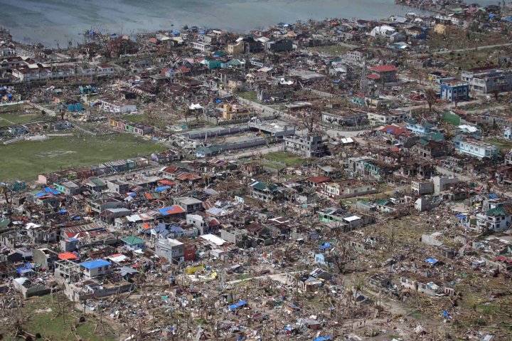 Aid begins to arrive in Typhoon-ravaged Philippines - National ...