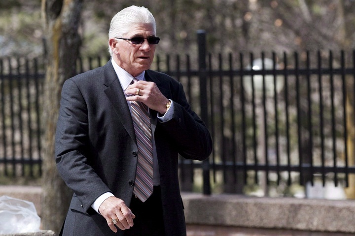 File: Former Toronto Maple Leafs captain Rick Vaive adjusts his tie as he enters a courthouse where he is expected to receive his sentence on impaired driving charges in Newmarket, Ont., on Thursday, April 12, 2012. 
