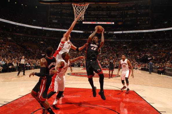 Udonis Haslem #40 of the Miami Heat goes to the basket against the Toronto Raptors on November 5, 2013 at the Air Canada Centre in Toronto, Ontario, .